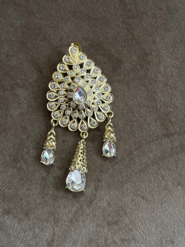 Broche doré